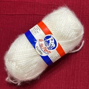 1 skein of Lana Moro flurri brushed white yarn ll